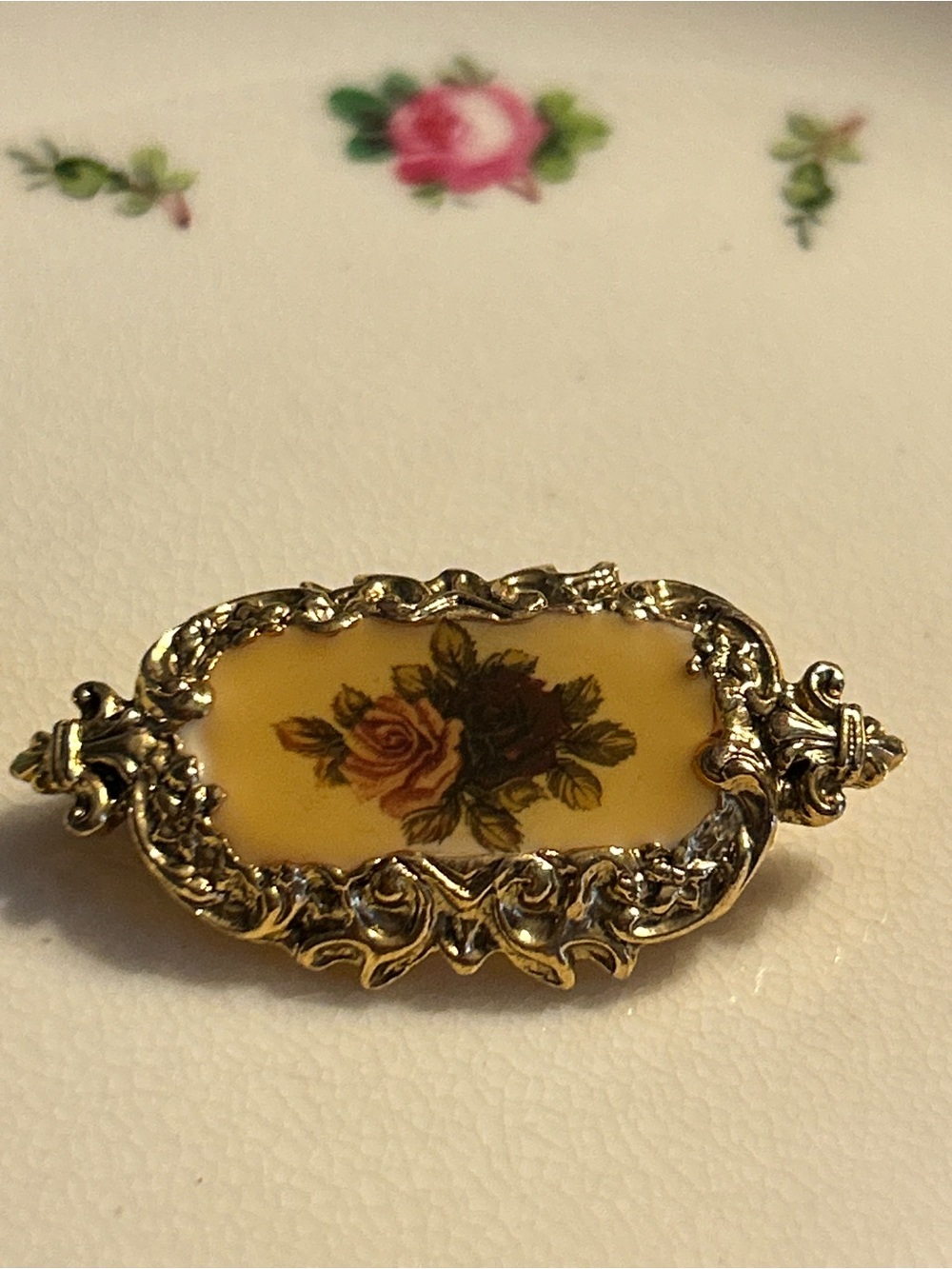 1928 Yellow Porcelain Floral Brooch with Gold-Tone Frame pin